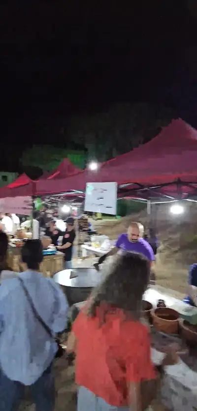 People around the food stalls at night