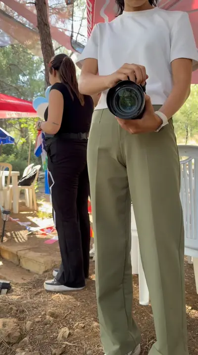 A photographer holding a camera at the event